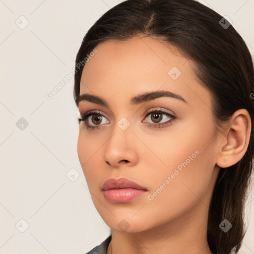 Neutral white young-adult female with long  brown hair and brown eyes