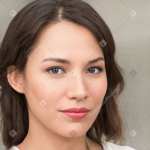 Neutral white young-adult female with medium  brown hair and brown eyes