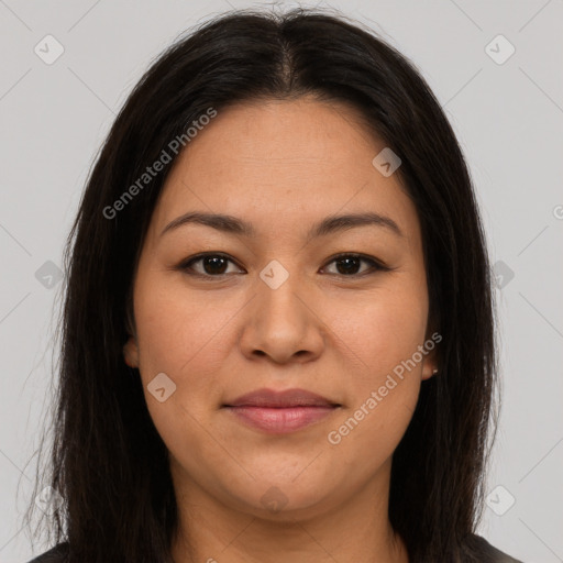 Joyful latino young-adult female with long  brown hair and brown eyes