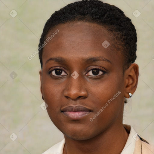 Neutral black young-adult female with short  brown hair and brown eyes