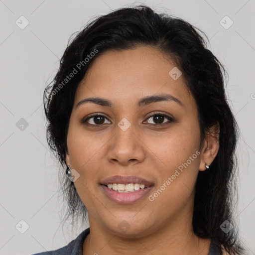 Joyful latino young-adult female with medium  black hair and brown eyes