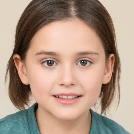 Joyful white child female with medium  brown hair and brown eyes