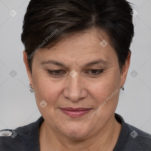 Joyful white adult female with medium  brown hair and brown eyes