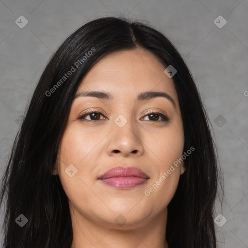 Joyful latino young-adult female with long  black hair and brown eyes