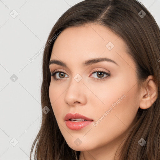 Neutral white young-adult female with long  brown hair and brown eyes