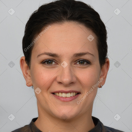 Joyful white young-adult female with short  brown hair and grey eyes