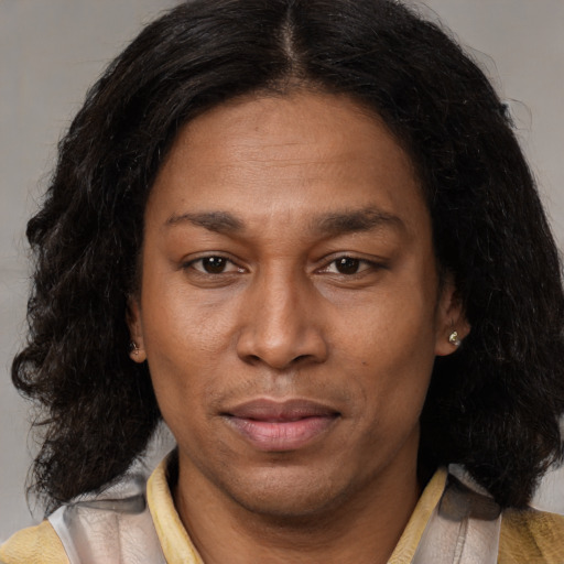 Neutral latino adult female with medium  brown hair and brown eyes