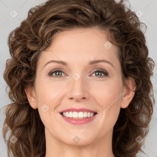 Joyful white young-adult female with medium  brown hair and green eyes