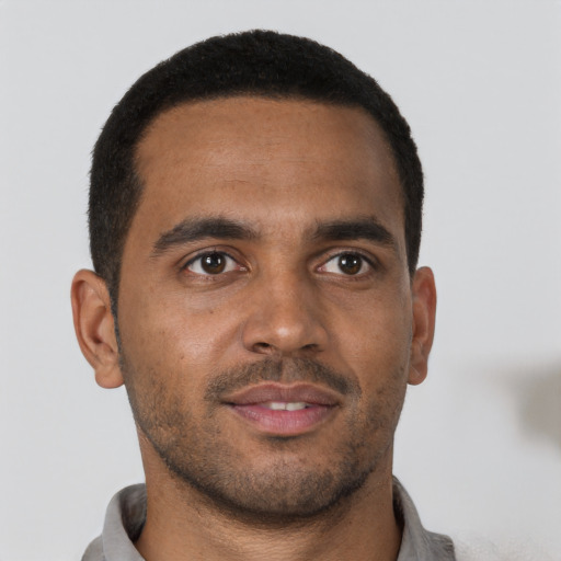 Neutral black young-adult male with short  brown hair and brown eyes