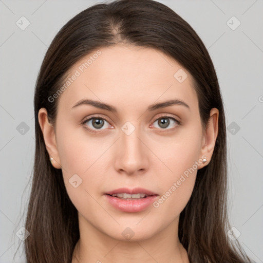 Neutral white young-adult female with long  brown hair and brown eyes