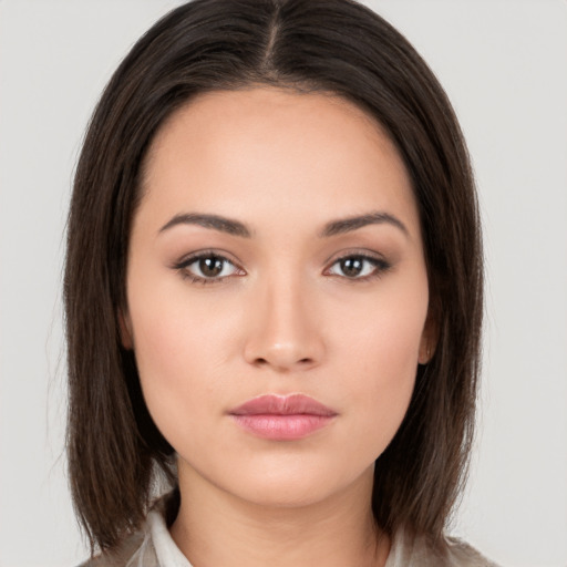 Neutral white young-adult female with medium  brown hair and brown eyes