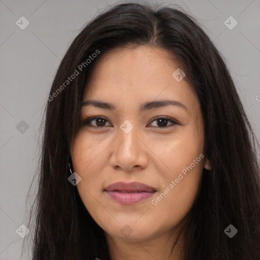 Joyful latino young-adult female with long  brown hair and brown eyes