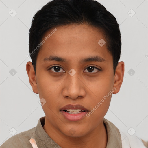 Joyful latino young-adult male with short  brown hair and brown eyes
