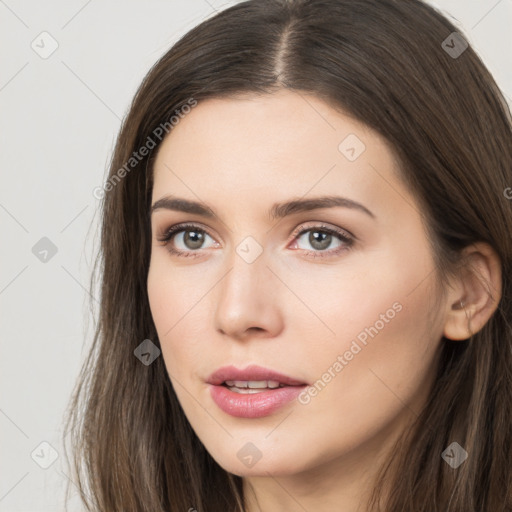 Neutral white young-adult female with long  brown hair and brown eyes