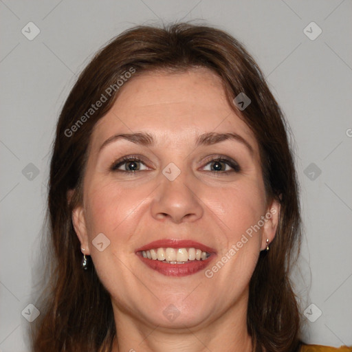 Joyful white adult female with medium  brown hair and brown eyes