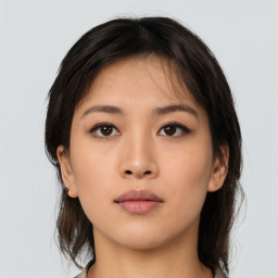 Neutral asian young-adult female with medium  brown hair and brown eyes