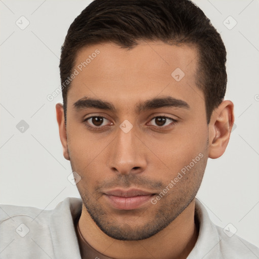 Neutral white young-adult male with short  brown hair and brown eyes