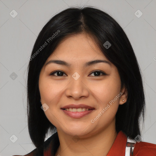 Joyful asian young-adult female with medium  black hair and brown eyes