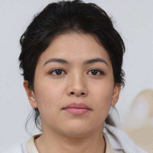 Neutral asian young-adult female with medium  brown hair and brown eyes