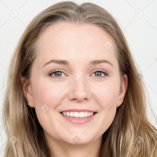 Joyful white young-adult female with long  brown hair and grey eyes