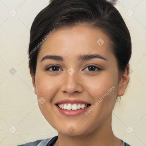 Joyful white young-adult female with long  brown hair and brown eyes