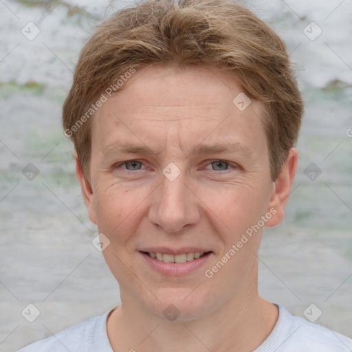 Joyful white adult female with short  brown hair and grey eyes