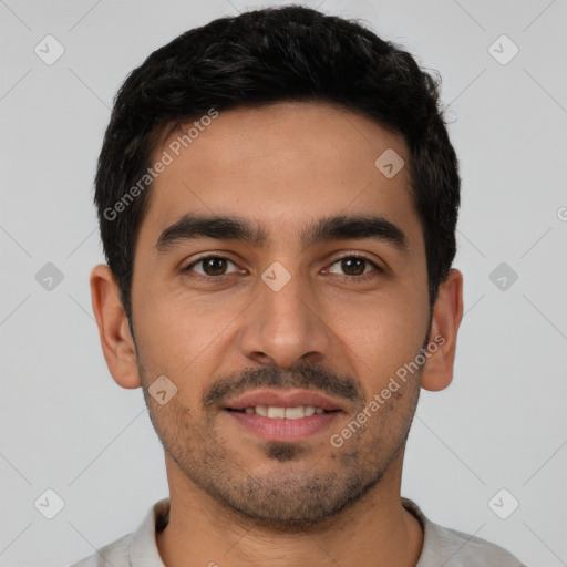 Joyful latino young-adult male with short  black hair and brown eyes