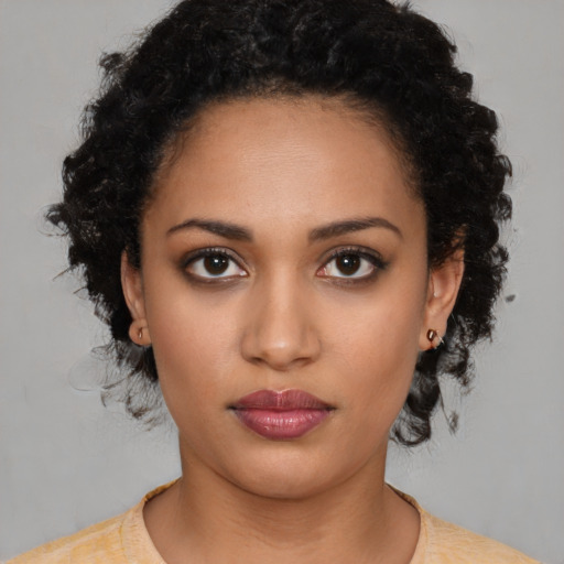 Neutral latino young-adult female with medium  black hair and brown eyes