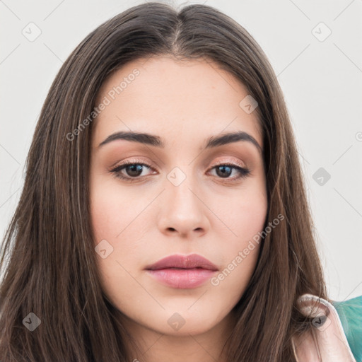 Neutral white young-adult female with long  brown hair and brown eyes