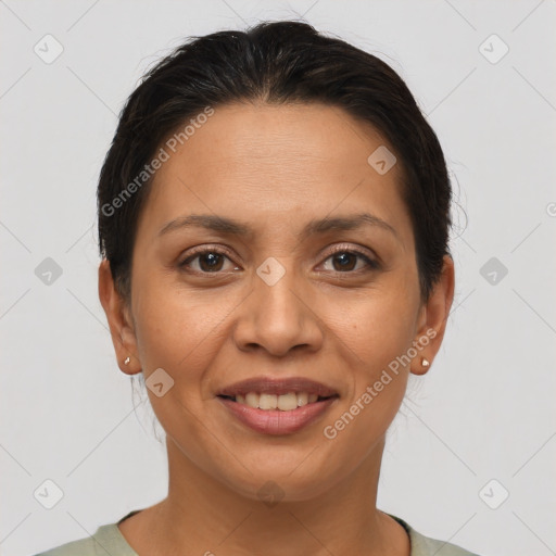 Joyful latino young-adult female with short  brown hair and brown eyes