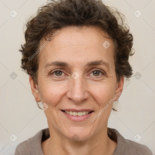 Joyful white adult female with short  brown hair and brown eyes