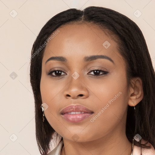 Joyful latino young-adult female with long  black hair and brown eyes