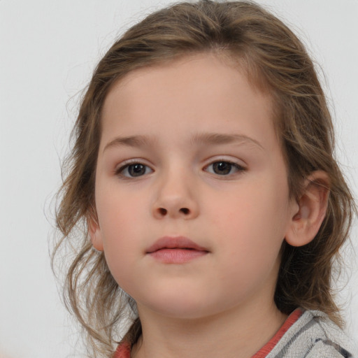 Neutral white child female with medium  brown hair and grey eyes