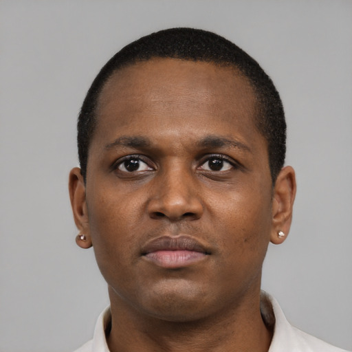 Neutral black young-adult male with short  brown hair and brown eyes