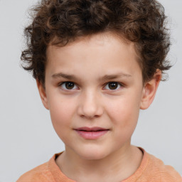 Joyful white child male with short  brown hair and brown eyes