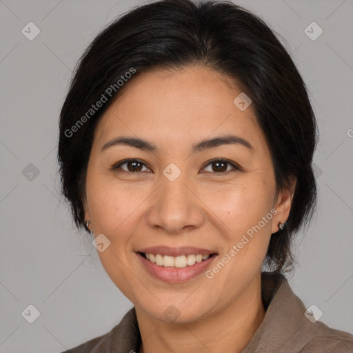 Joyful white adult female with medium  brown hair and brown eyes