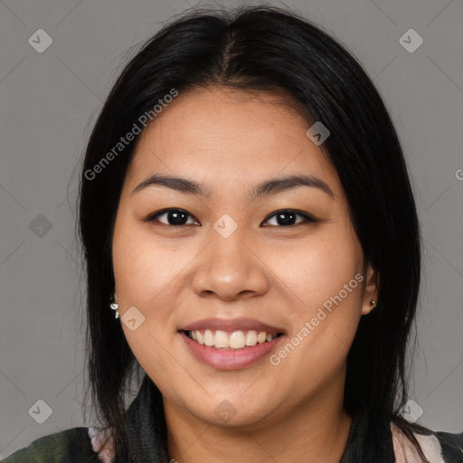 Joyful asian young-adult female with long  black hair and brown eyes