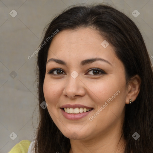 Joyful white young-adult female with long  brown hair and brown eyes