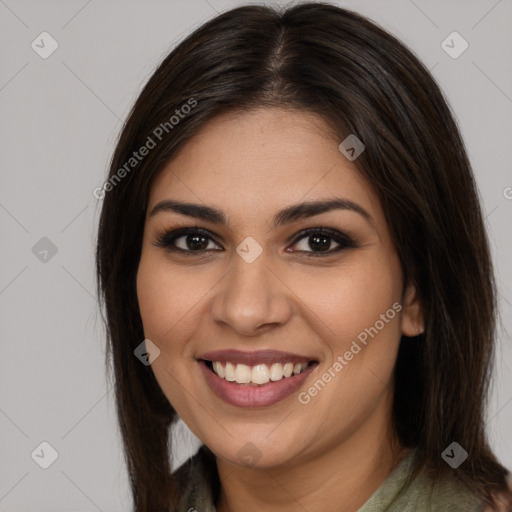 Joyful white young-adult female with long  brown hair and brown eyes