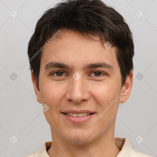 Joyful white young-adult male with short  brown hair and brown eyes