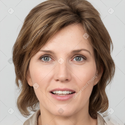 Joyful white young-adult female with medium  brown hair and blue eyes