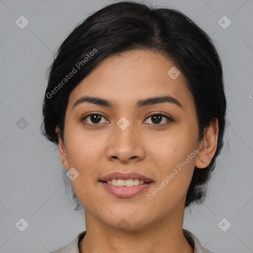 Joyful asian young-adult female with medium  black hair and brown eyes