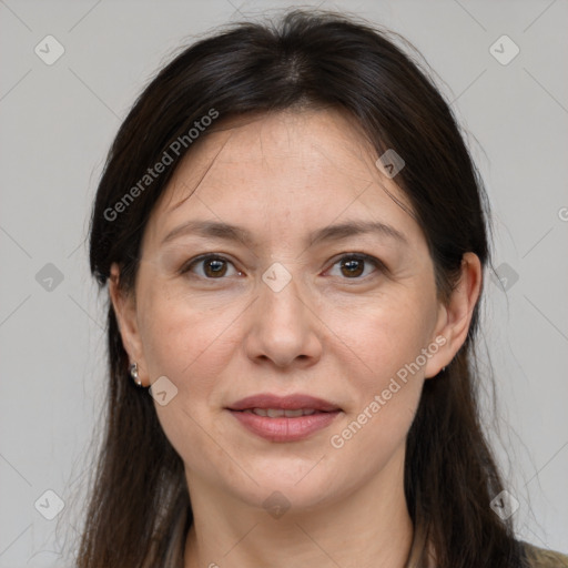 Joyful white adult female with medium  brown hair and grey eyes