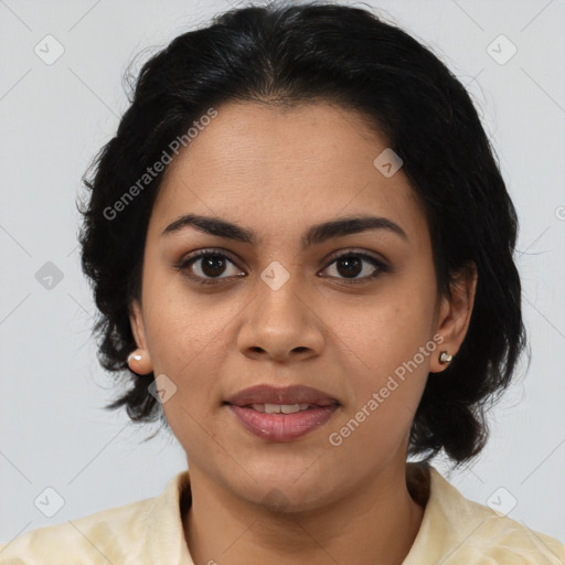 Joyful latino young-adult female with medium  black hair and brown eyes