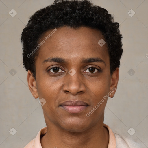 Joyful black young-adult male with short  brown hair and brown eyes