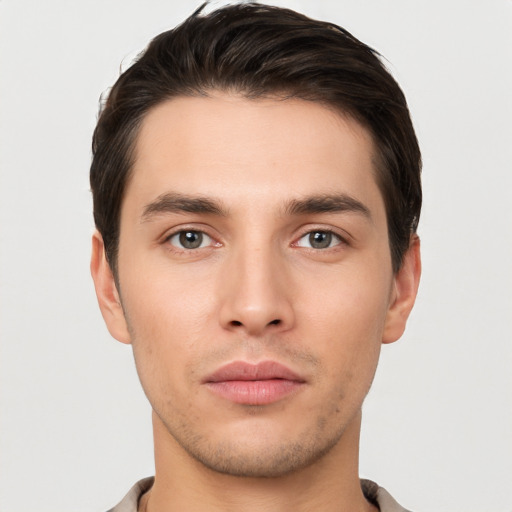 Neutral white young-adult male with short  brown hair and brown eyes