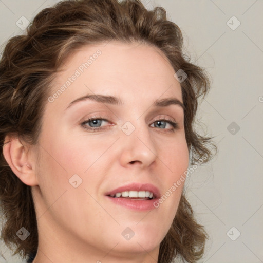 Joyful white young-adult female with medium  brown hair and green eyes