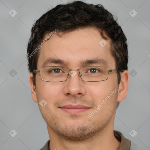 Joyful white adult male with short  brown hair and brown eyes