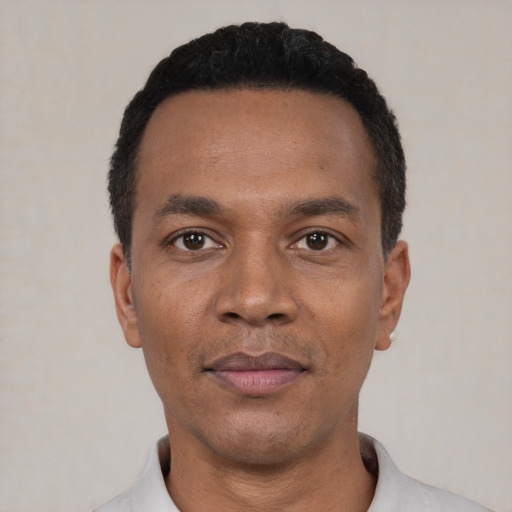 Neutral black adult male with short  black hair and brown eyes