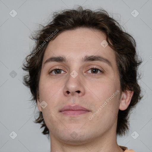 Neutral white young-adult male with medium  brown hair and brown eyes